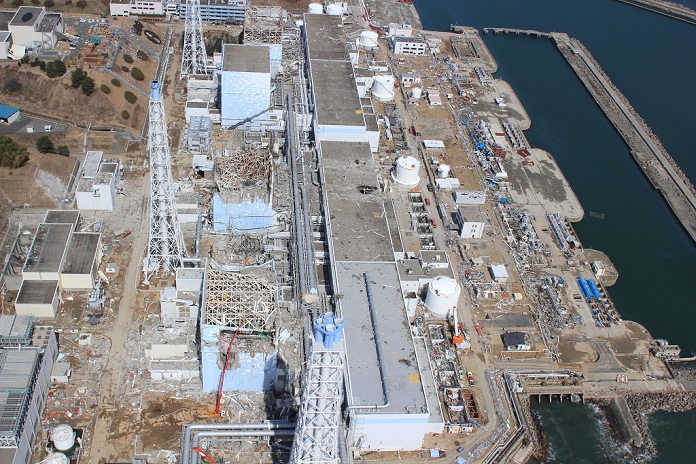 Fukushima Nuclear Power Plant, Clearly Damaged Photographed by a civilian drone  Courtesy photo  In this March 24, 2011 aerial photo taken by small unmanned drone and released by AIR PHOTO SERVICE, the crippled Fukushima Dai ichi nuclear power plant is seen in Okumamachi, Fukushima prefecture, northern Japan. From bottom to top, Unit 4 through Unit 1.  Photo by AFLO AIR PHOTO SERVICE Handout   ty    MANDATORY CREDIT  