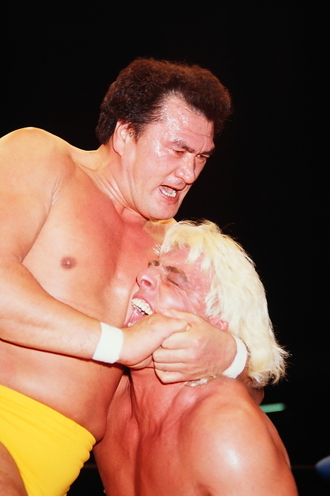 Japanese vintage pro wrestling NWA World Heavyweight Title challenger Daishi Wajima puts champion Ric Flair  right  in a headlock.   Photo by Yukio Hiraku AFLO 