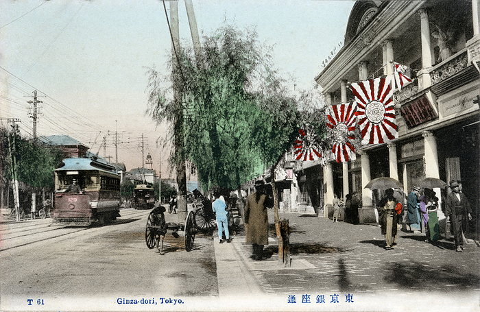 160305 0041   Ginza Street View Streetcars and pedestrians on Ginza in Tokyo, ca. 1907  Meiji 40 .  The building on the right, with the rising sun flags     , Kyokujitsu ki , is Tenshodo      .  Located at Ginza Owari cho         since 1879  Meiji 12 , Tenshodo sold seals, stamps, watches and diamonds. The company was famed for its innovative marketing and even helped fund Japan s first beauty contest.  In the far background, the landmark tower of the Hattori Building           can be seen.  It was the home of K. Hattori   Co., a watch and jewellery shop opened in 1881  Meiji 14  by Kintaro Hattori       , 1860 1934 .  Photo by MeijiShowa AFLO