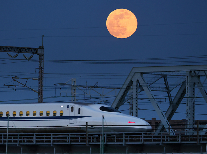 The Flower Moon is observed above a bullet train May 7, 2020, Kawasaki, Japan   The Flower Moon appears above Japan Railway s bullet train on a railway bridge in Kawasaki, suburban Tokyo on Thursday, May 7, 2020. The pink colored super moon is observed bigger and brighter than usual full moon.     Photo by Yoshio Tsunoda AFLO 