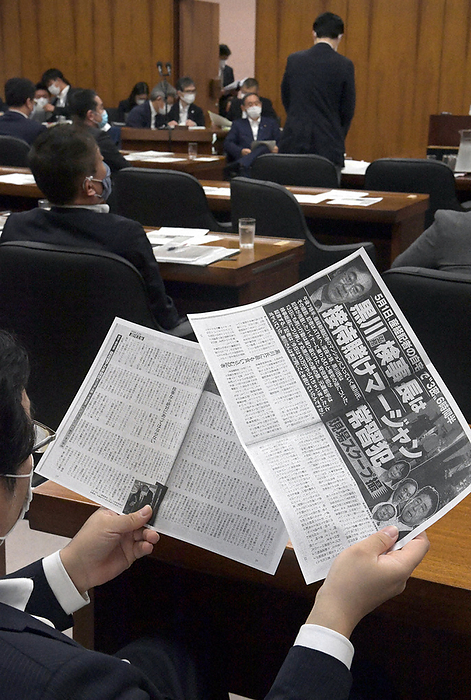 A member of the House of Representatives Cabinet Committee reads a copy of a Weekly Bunshun article reporting on allegations of  betting mah jongg  by Hiromu Kurokawa, chief public prosecutor of the Tokyo High Public Prosecutors Office, who is in the middle of a controversy over the extension of his retirement age. A member of the House of Representatives reads a copy of a Weekly Bunshun article reporting on the  betting and mahjong  scandal involving Hiromu Kurokawa, chief public prosecutor of the Tokyo High Public Prosecutors Office, who is in the middle of the retirement age extension issue, at the House of Representatives Cabinet Committee meeting in the Diet in 2020. May 20, 2:42 p.m.  photo by Mikiharu Takeuchi