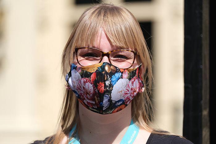 Netherlands Under Coronavirus Pandemic A staff of the  Mauritshuis museum wears a mask as she stands at the entrance on June 2,  2020 in The Hague, Netherlands. The museum reopened on June 1, but tickets need to be reserved in advance to avoid crowds.   Photo by Yuriko Nakao AFLO   