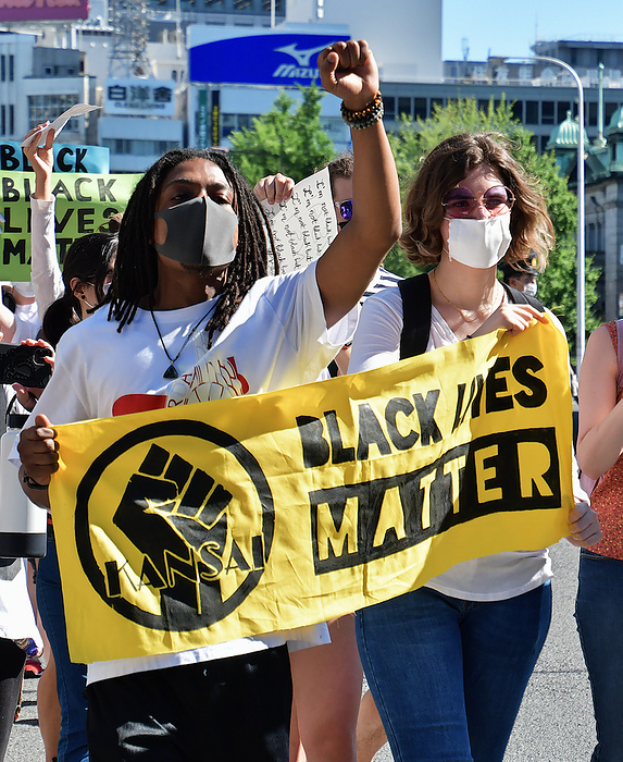 Peaceful march for Black Lives Matter movement in Osaka Participants wearing a face masks while shouting slogans during a march for Black Lives Matter movement in Osaka, Japan on June 7, 2020. ANTIFA s flags were not seen in this march.