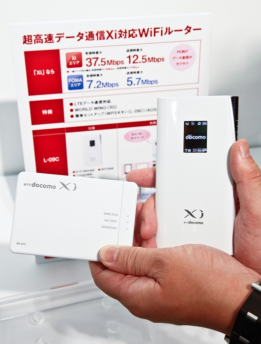 docomo Announces Summer Models Mobile Wi Fi Router May 16, 2011, Tokyo, Japan   Two mobile Wi Fi rooters, BF 10c, left, and L 09C are introduced during a launch by NTT DoCoMo of its new summer mobile devices Both routers are compatible with DoCoMo s extra high speed service.  Photo by AFLO   3609   mis 