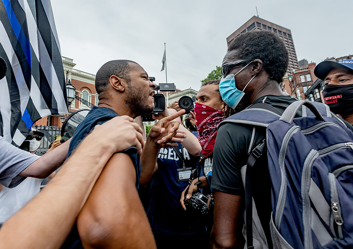 Police Supporters Demonstrate in Boston, U.S. Black Opposition Groups Also Gather in Protest June 27, 2020, Boston, Massachusetts, USA: A pro police demonstrator  L  argues with a counter protester during a pro police rally outside the Statehouse in Boston.  Photo by Keiko Hiromi AFLO  