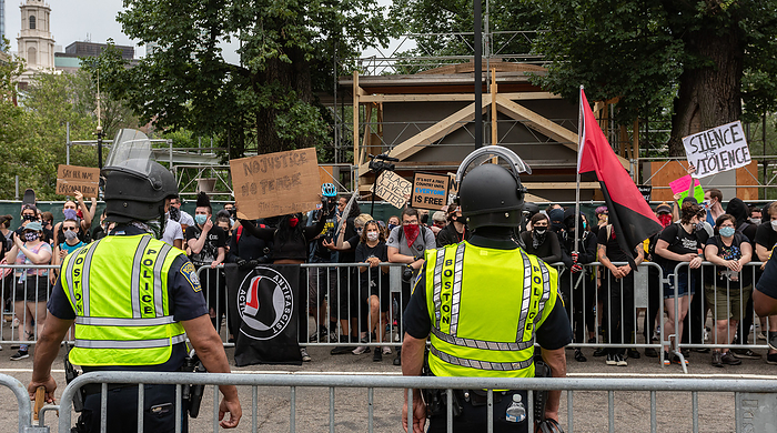 Police Supporters Demonstrate in Boston, U.S. Black Opposition Groups Also Gather in Protest June 27, 2020, Boston, Massachusetts, USA: Police officers stand guard as several hundred counterprotesters gather during a pro police rally outside the Statehouse in Boston.  Photo by Keiko Hiromi AFLO  