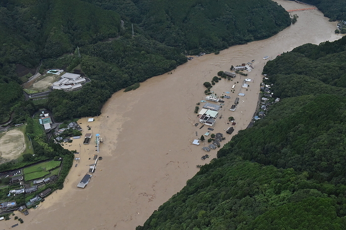 The Kuma River flooded due to record breaking rainfall. Near the submerged Sakamoto branch office. The Kuma River flooded due to record breaking rainfall. The area near the submerged Sakamoto branch office is photographed by Kimiya Tanabe from a helicopter at 11:13 a.m. on July 4, 2020 in Sakamoto, Sakamoto cho, Yatsushiro City, Kumamoto Prefecture.