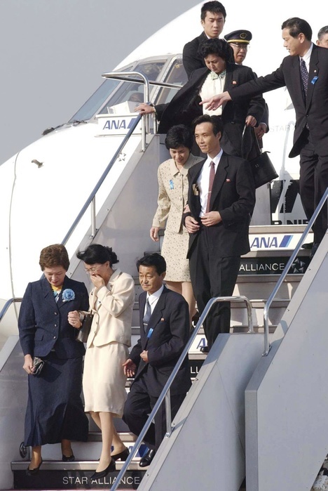 Abductees disembarking from a government chartered plane after arriving in Japan from North Korea 2002 Abductees disembarking from a government chartered plane after arriving in Japan from North Korea for the first time in 24 years. Yasushi Jimura  front right , Fukie Hamamoto  center , Kaoru Hasuike  second row, right , Yukiko Okudo  left , and Hitomi Soga  third row, center . At Haneda Airport.  The Japanese government presses North Korea to resolve the abduction issue, but North Korea refuses to face the issue. 20 years have passed without any significant progress.