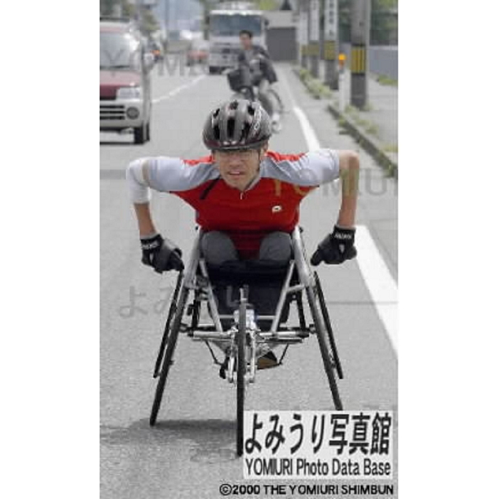 Toshihiro Takada  wheelchair marathoner  training hard for the event   Fukui 2002 Toshihiro Takada, the Japanese record holder in the wheelchair marathon, training for the event  April 27, 2002, in Fukui City .