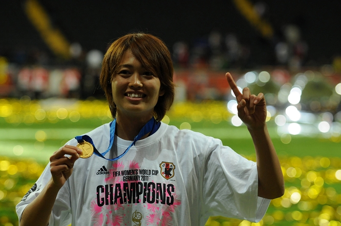 2011 FIFA Women s World Cup Nadeshiko Japan wins first place Kozue Ando  JPN , JULY 17, 2011   Football : Kozue Ando of Japan celebrates her gold medal after winning the FIFA Women s World Cup Germany 2011 Final match between Japan 2 3 1 2 United States at Commerzbank Arena in Frankfurt, Germany.
