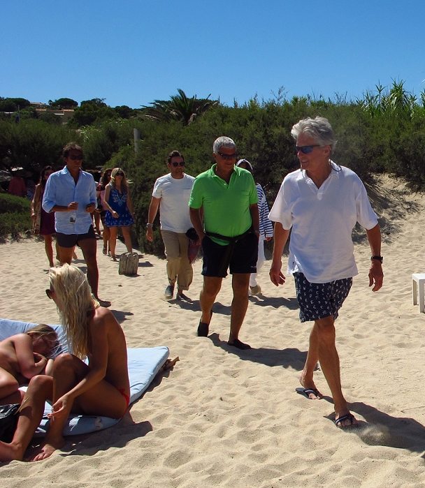 Michael Douglas and Larry Gagosian, Jul 18, 2011 : Michael Douglas looking a topless women on the beach and Larry Gagosian (green shirt) after lunch. Club 55 Restaurant..St Tropez, France..Monday, July 18, 2011.