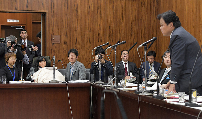 Eiko Kimura  second from left , a member of the  Reiwa Shinsengumi,  asks a question for the first time with caregivers at the Upper House Committee on Land, Infrastructure, Transport and Tourism, and listens to Minister of Land, Infrastructure, Transport and Tourism Kazuyoshi Akaha  far right  answer. Eiko Kimura  second from left , a member of the  Reiwa Shinsengumi,  asks a question for the first time with her caregivers at the Upper House Committee on Land, Infrastructure, Transport and Tourism, and listens to the answer of Minister of Land, Infrastructure, Transport and Tourism Kazuyoshi Akaha  far right , in the Diet, November 5, 2019, 3:46 pm  photo by Masahiro Kawada
