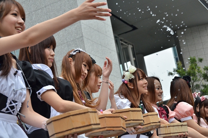 Uchimizu Event in Akihabara 50 maids and others participated  July 31, 2011, Tokyo, Japan   Maid cosplayers sprinkling water: This summer, Japan is concerned for saving electricity due to the Fukushima nuclear plant disaster. Maids cos players are doing water sprinkling to make the temperature cooler in Akihabara, Japan.  Photo by Yumeto Yamazaki AFLO 