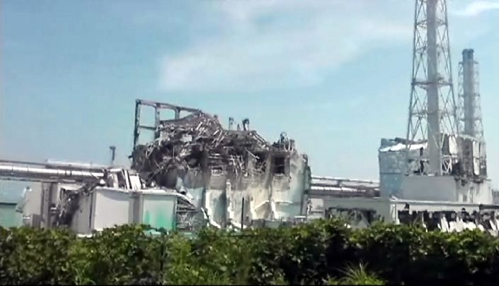 Fukushima Daiichi Nuclear Power Plant Accident Director Yoshida apologizes in video  Video image provided by TEPCO  August 17, 2011, Okumamachi, Japan   The badly damaged No. 3 reactor building is shown in this frame grabbed image from the six minute video footage released on Wednesday, August 17, 2011, by Tokyo Electric Power Co., the operator of the crippled Fukushima No. 1 nuclear power plant in Okumamachi, Fukushima Prefecture, some 210km northeast of Tokyo.   The untility, known as TEPCO, and the government restated the nine month roadmap to bring the runaway reactors to a safe shutdown by January 2012 at the Fukushima plant. TEPCO said there has been progress in its goal of stopping radiation emissions, saying the amount of radiation releases into the atmosphere from the plant dropped to 1 10,000,000th of the levels immediately after the plant was hit by a magnitude 9 earthquake March 11.  Photo by TEPCO AFLO   0006   mis 
