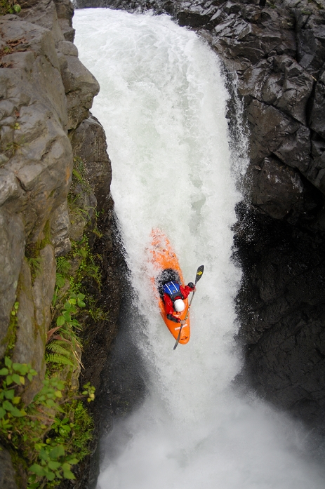 A kayaker takes the plunge on huge waterfall on the  Alseseca River in the Veracruz region of Mexico.