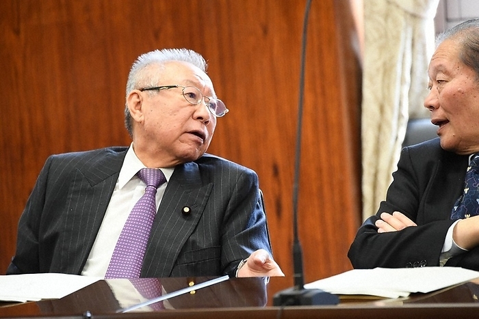 Former LDP Minister in charge of disaster prevention, Shohatsu Konoike, before the Upper House Environment Committee. Former LDP Minister of State for Disaster Prevention Shohatsu Konoike  left  speaks with his colleagues before the opening of the Upper House Environment Committee meeting at 0:21 p.m. on March 7, 2017, in the Diet  photo by Masahiro Kawada.