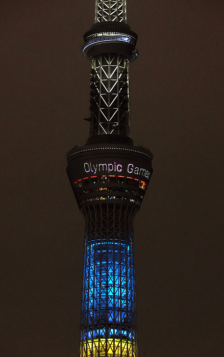 An Olympic venue Areake Arena is lit up with five Olympic symbol colors July 23, 2020, Tokyo, Japan   Japan s tallest tower Tokyo Skytree is lit up with five Olympic symbol colors and a message to mark one year to go for the Tokyo Olympic Games in Tokyo on Thursday, July 23, 2020. Tokyo 2020 Olympic Games was postponed one year amid outbreak of the new coronavirus.       Photo by Yoshio Tsunoda AFLO 