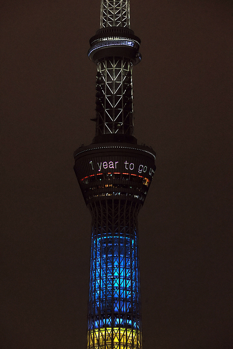 An Olympic venue Areake Arena is lit up with five Olympic symbol colors July 23, 2020, Tokyo, Japan   Japan s tallest tower Tokyo Skytree is lit up with five Olympic symbol colors and a message to mark one year to go for the Tokyo Olympic Games in Tokyo on Thursday, July 23, 2020. Tokyo 2020 Olympic Games was postponed one year amid outbreak of the new coronavirus.       Photo by Yoshio Tsunoda AFLO 
