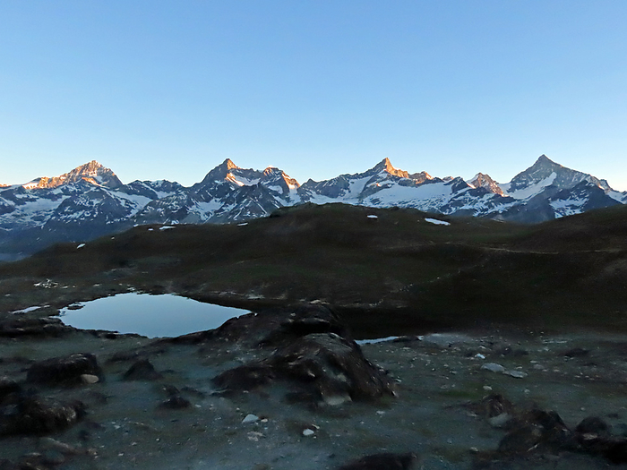 Mountains such as Dan Blasch at sunrise from Riffelsee, Zermatt, Switzerland