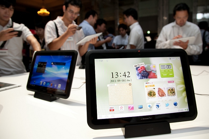 Two New Tablet Models Released Compatible with docomo s high speed communication September 8, 2011, Tokyo, Japan   Units of Fujitsu Arrows Tab LTE, one of the two new tablet devices compatible with its extra high speed next generation Long Term Evolution service, are displayed during a launch by Japan s NTT Docomo in Tokyo on Thursday, September 8, 2011.   Arrows Tab LTE and Samsung s Galaxy Tab 10.1 LTE will go on sale in Japan in October. Both tablets, featuring large 10.1 inch displays, are powered by dual core CPUs running on Android 3.2.  Photo by AFLO   3609   mis 