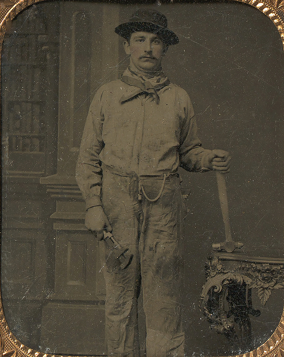 Workman Holding a Wrench and Hammer, 1860s. Creator: Unknown. Workman Holding a Wrench and Hammer, 1860s.