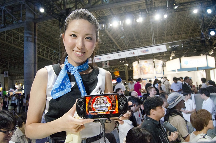 Tokyo Game Show Opens Social Games in the Spotlight  September 15, 2011, Chiba, Japan   Sony s campaign girl poses for pictures with the PlayStation Vita during the Tokyo Game Show 2011 in Makuhari near Tokyo, Japan : The Tokyo Game Show, which is the world s largest computer entertainment festival, is held from September 17th to 18th with enjoyment of playing video games. Visitors can try newly promoted games and devices such as the PlayStation Vita. For this year, 192 game companies participate this event.  Photo by Yumeto Yamazaki AFLO   3686 