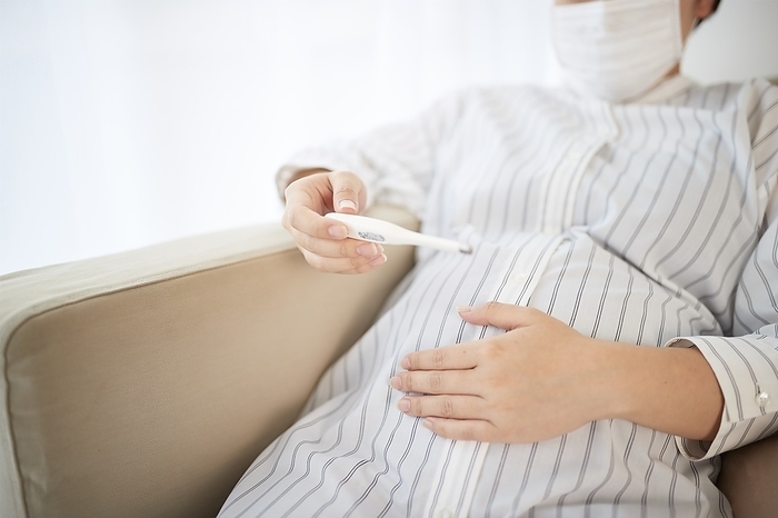 Pregnant women taking body temperature