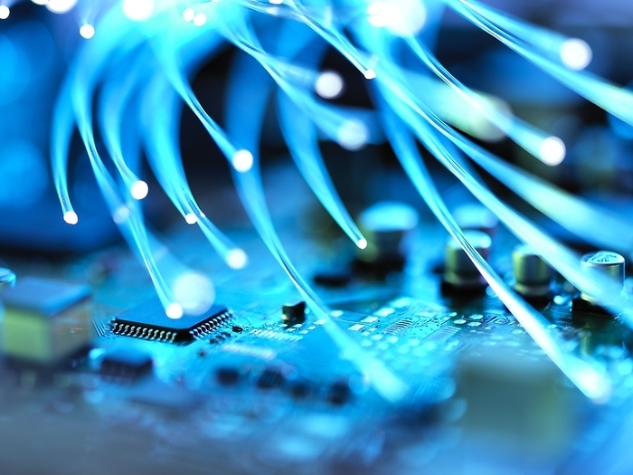 Digital communication Fibre optics used to send data darting past circuit boards.