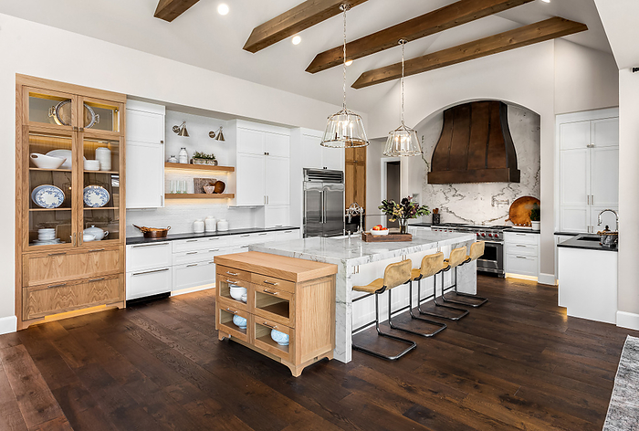 Kitchen in luxury home with large island and hardwood floors, Portland, OR, United States