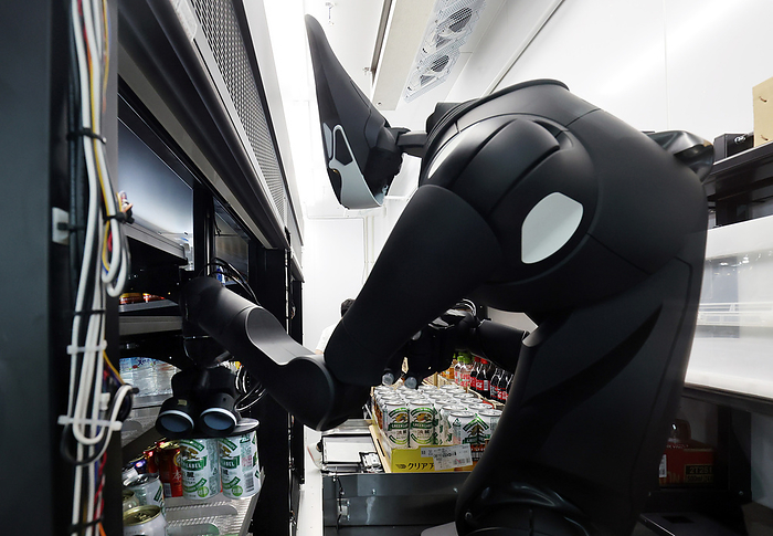 Robots work at newly opened Tokyo Portcity Takeshiba building September 14, 2020, Tokyo, Japan   Japanese robot venture Telexistance s master slave robot Model T replenishes canned beverages to the drink shelf of the Lawson convenience store at the newly opened Tokyo Portcity Takeshiba building in Tokyo on Monday, September 14, 2020. The building officially opened on September 14 and IT giant Softbank moved its headquarters.        Photo by Yoshio Tsunoda AFLO 