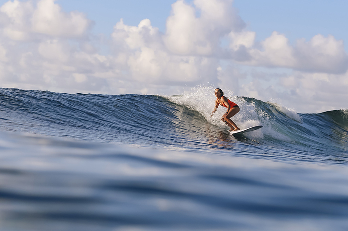 Female surfer on surfboard