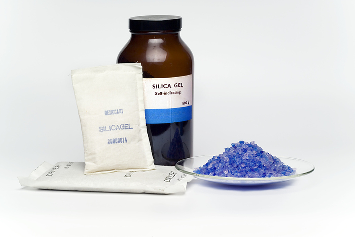 Silica gel Silica gel. Packets, bottle and a watch glass containing silica gel. Silica gel is a granular form of silica, synthetically manufactured from sodium silicate. It has an extremely high porosity, making it a highly effective adsorbent material. The large internal surface area enables each granule to attract and hold moisture through physical adsorbtion and capillary condensation. Packaged in a semi permeable packet, silica gel is used as a desiccant to keep a variety of packaged goods dry. Indicator substances are added to silica gel which change colour when moist. Cobalt  II  chloride has been added to the granules on the watch glass. It is blue when dry and changes to pink when moist. Silica gel itself is inert and non toxic, but the cobalt  II  chloride is toxic and carcinogenic.