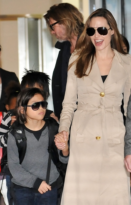 Angelina Jolie, Pax Jolie-Pitt, Nov 07, 2011 : Tokyo, Japan : Actor Brad Pitt, actress Angelina Jolie and their children arrive at Haneda airport in Tokyo, Japan on November 8, 2011.