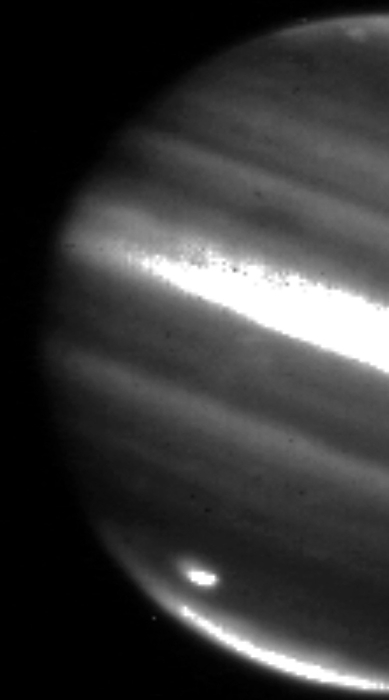 Jupiter impact site Jupiter impact site. Infrared image of a large impact site on Jupiter s south polar region that appeared on 19th July 2009. It is thought to have been caused by a small comet or asteroid. A trail of debris can be seen to the northwest  upper left  of the impact site. Image taken by NASA s Infrared Telescope Facility in Mauna Kea, Hawaii, USA, on 20th July 2009.