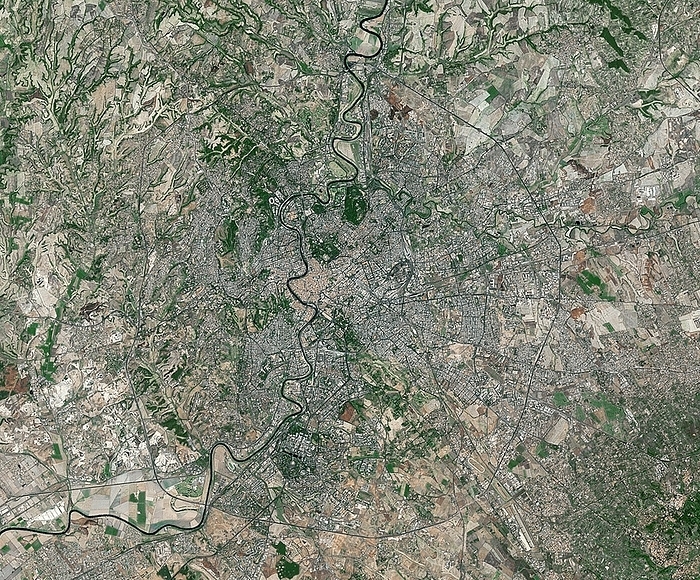 Rome, Italy, satellite image Rome, Italy. Satellite image of Rome, the capital city of Italy. North is at top. Rome is situated on the banks of the river Tiber and has a history spanning over two and a half thousand years. Forested areas are dark green, bare ground is brown, urban areas are grey, and water is black. Image created using NaturalVue data obtained from the Landsat 7 satellite.