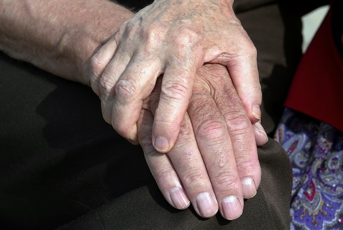 Senior friendship Senior friendship. Close up of two senior people holding hands. Photographed in Namur, Belgium.