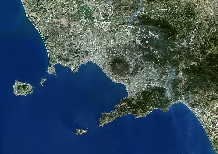 Gulf of Naples, Italy, satellite image Gulf of Naples, Italy. True colour Landsat satellite image of the Gulf of Naples on the Mediterranean coast of Italy. North is at top. The bay is bordered on the north by the cities of Naples and Pozzuoli  grey, centre , on the east by Mount Vesuvius  round, centre right , and on the south by the Sorrentine Peninsula  bottom right , with its main town Sorrento. Located in the gulf are  clockwise from bottom  the islands of Capri, Ischia and Procida. Image taken on 2nd August 2000.