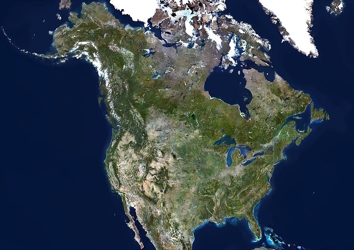North America, satellite image North America, satellite image. North is at top. Green areas are vegetated, yellow areas are desert and white areas are snow or ice. The Great Lakes are seen at centre left on the USA Canada border. At right is the Atlantic Ocean and at left is the Pacific Ocean. Composite image from Landsat 5 and 7 satellites.