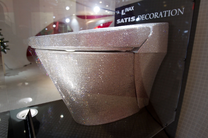 Super Luxurious Toilet Unveiled Decorated with 70,000 pieces of glass  December 14, 2011, Tokyo, Japan   Housing and building material manufacturer Lixil Corp. showcases the company s Inax brand toilet  Statis  covered in 72,000 Swarovski crystals valued approximately at  128,000 USD. Lixil showroom manager Kazuo Sumimiya said he hopes this heavily decorated one of a kind toilet will draw more tourists to Japan. The toilet will remain on display at Lixil s company showroom in Tokyo until December 28.  Photo by Christopher Jue AFLO   2331 