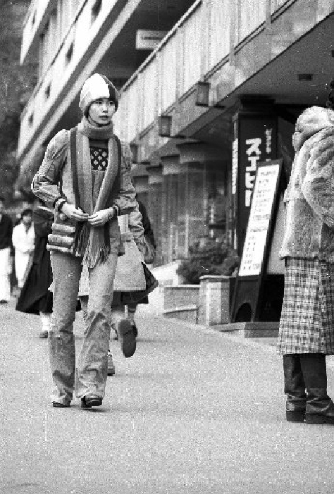 A woman wearing a trendy fur coat.  Harajuku, Tokyo. December 22, 1976  A woman wearing a trendy fur coat.  Harajuku, Tokyo. December 22, 1976 