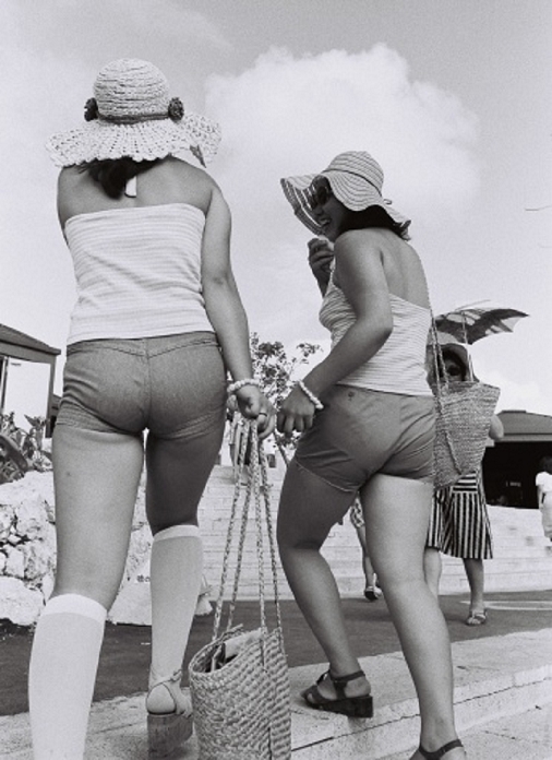 The Hot Pants Craze  July 26, 1975  Hot pants craze  July 26, 1975 : Young girls in hot pants on back bears visiting the Okinawa International Maritime Exposition, at Kariyushi Square in the venue, Motobu cho, Okinawa, Japan.
