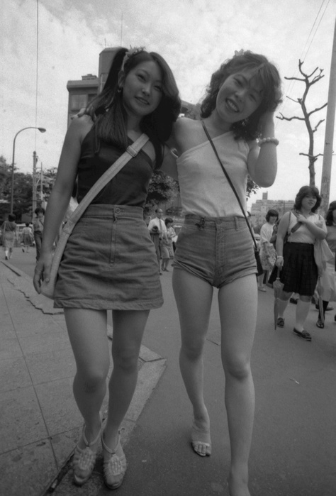  Caution Young women going about town in revived miniskirts and hot pants.  circa 1980 