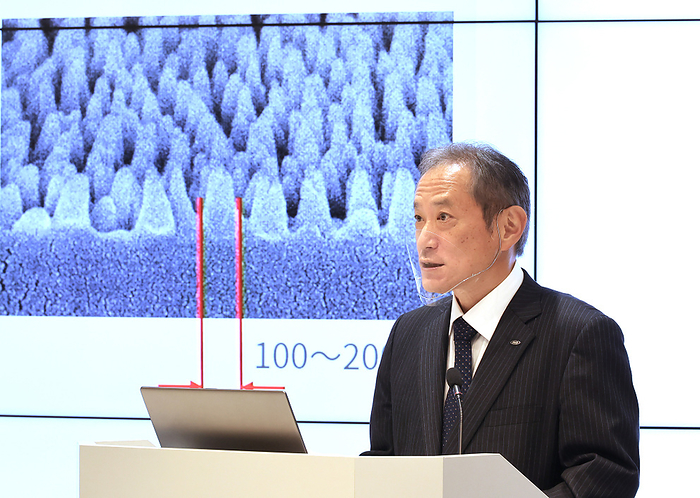 Sharp unveils the high performance face shied featuring low reflections and antifogging November 9, 2020, Tokyo, Japan   Japan s electronics giant Sharp general manager Akira Imai displays  microphotography of moth eye structures as the company unveils the high performance face shield featuring low reflections and antifogging at the company s Tokyo office in Tokyo on Monday, November 9, 2020. The new face shield which has processed as moth eye structure on the surface of a high transparent polycarbonate film will go on sale from this month.         Photo by Yoshio Tsunoda AFLO 