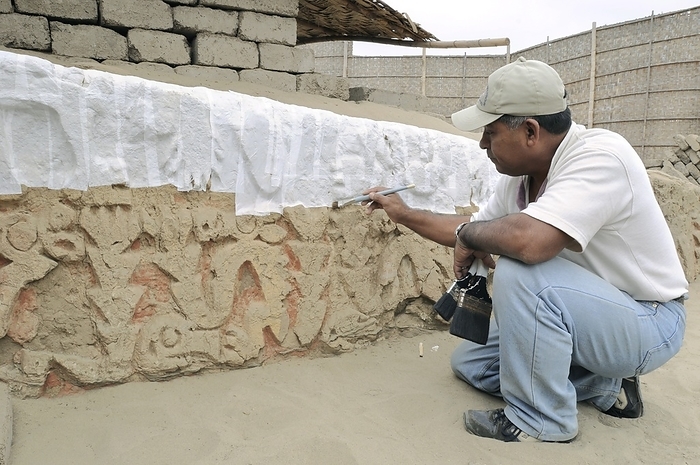 Ancient Peruvian carvings Ancient Peruvian carvings. Archaeologist uncovering bas relief carvings at a temple  Huaca Gloria  at the Chotuna Chornancap archaeological site, in northern Peru. The temple was built by the Lambayeque people, also referred to as the Sican culture. These pre Inca people inhabited an area on the coastline of what is now northern Peru for several hundred years  750 to 1375 . These are animal carvings. Photographed in 2009.