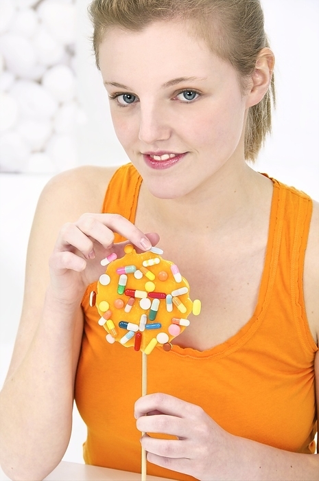 Overprescription of drugs Overprescription of drugs. Conceptual image of a woman selecting drugs from pills that have been stuck on a large lollipop. This image can represent the overprescription and overuse of drugs, with the drugs being given out like candy. Overuse of certain drugs, such as antibiotics, can cause some bacteria to develop a resistance to the drugs.