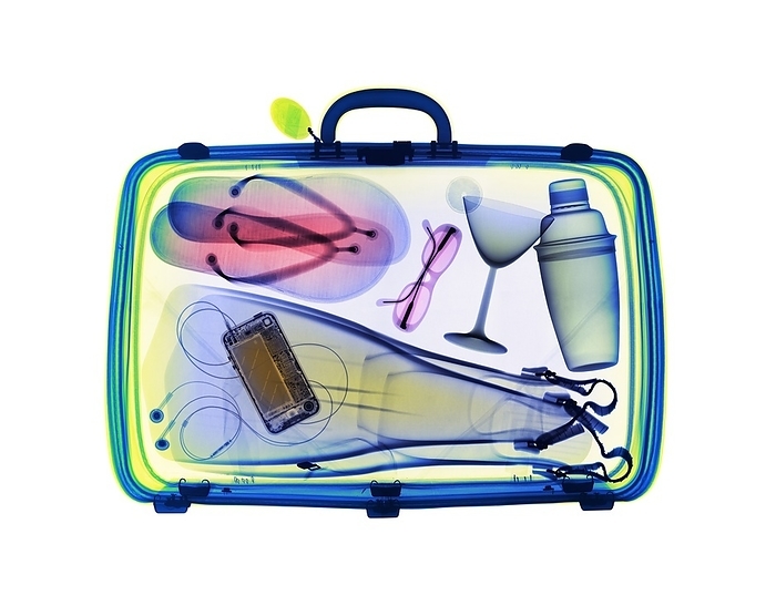 Holiday suitcase, X ray Holiday suitcase, coloured X ray.