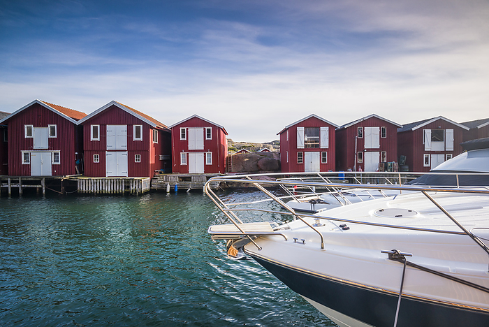 Sweden Sweden, Bohuslan, Smogen, Smogenbryggan, antique boat houses and fishing shacks, Photo by Walter Bibikow