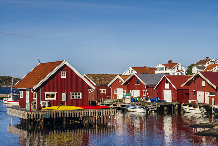 Sweden Sweden, Bohuslan, Kungshamn, red fishing shacks in the Fisketangen, old fisherman s neighborhood, Photo by Walter Bibikow