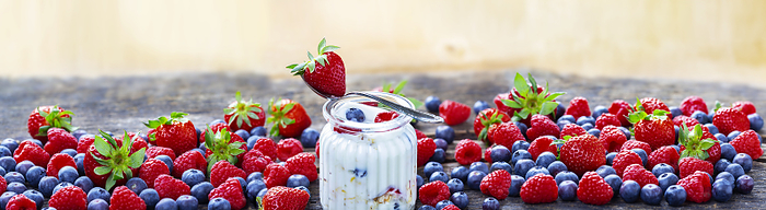 Healthy breakfast, yogurt with berries and cereals, Photo by fotoknips