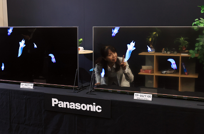 Panasonic announces transparent OLED display. November 20, 2020, Kadoma, Japan   Japanese electronics giant Panasonic unveils 55 inch sized transparent organic light emitting diode  OLED  panel at the company s laboratory in Kadoma city in Osaka on Friday, November 20, 2020. Panasonic will put two models on the market next month, one is see through model and another is dimmable model with dimming unit which can display high contrast and clear images.        Photo by Yoshio Tsunoda AFLO  